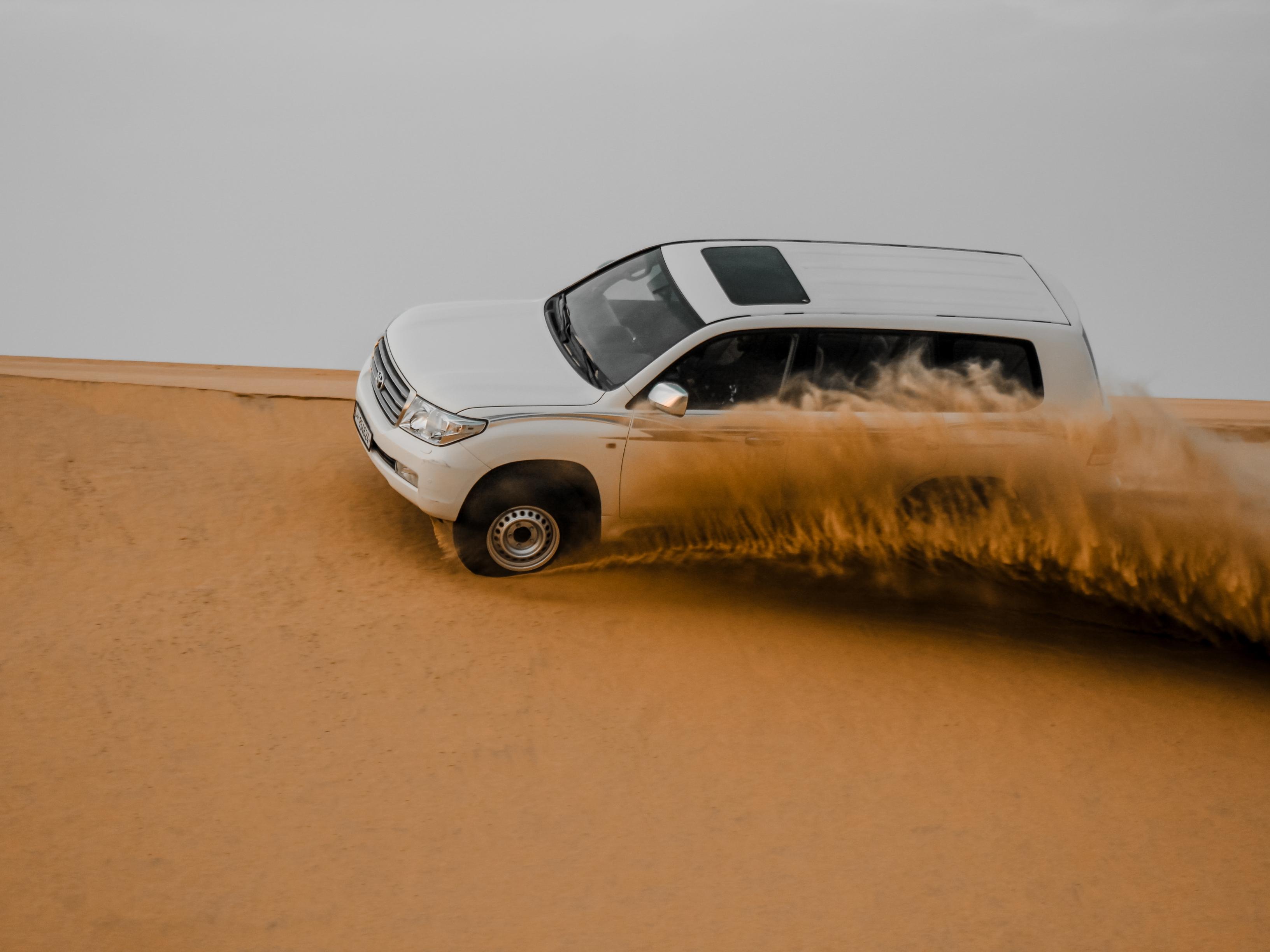 Qatar Desert Safari, Quad bike, Camel Ride and Sandboarding 3