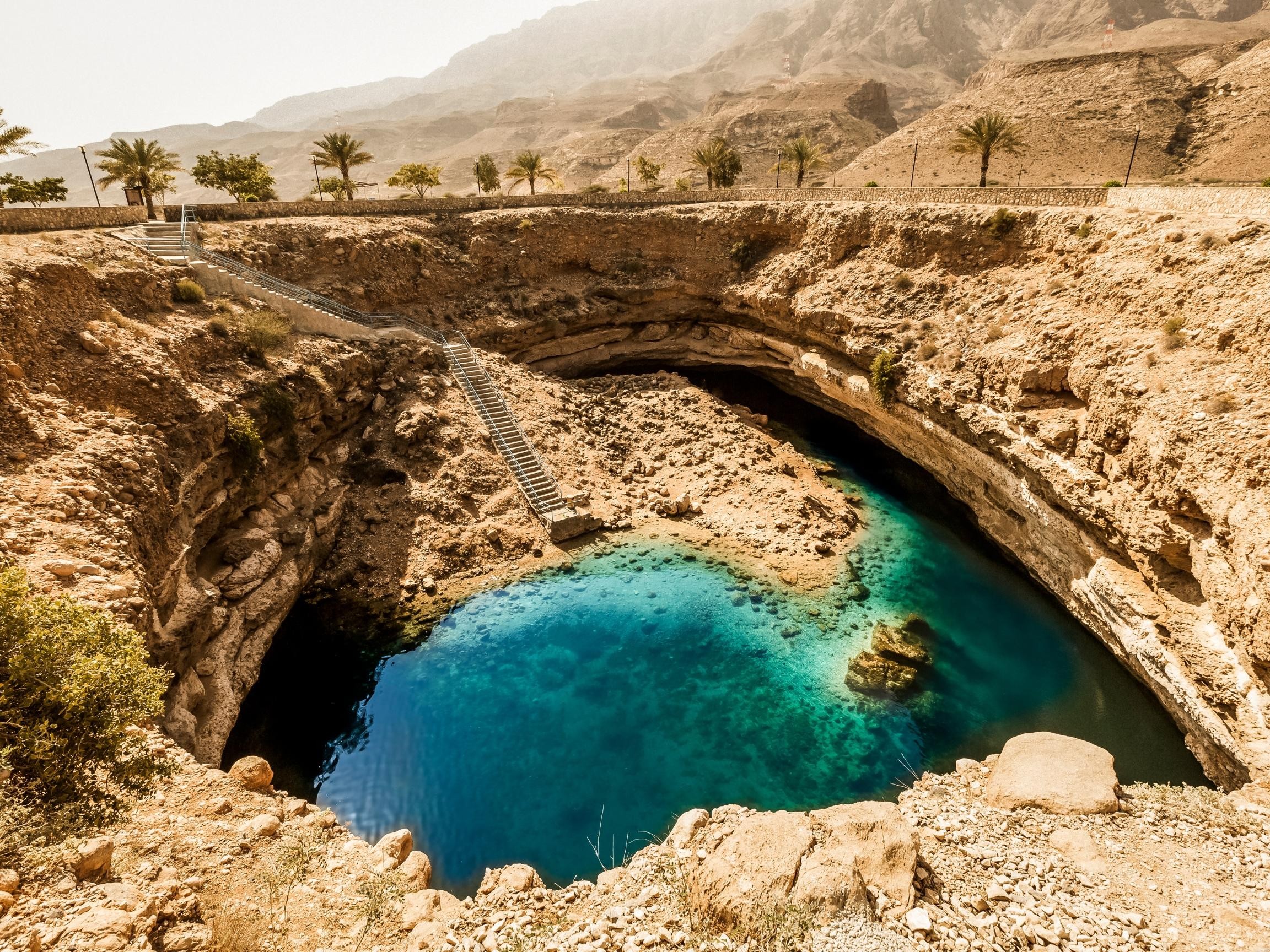 From Muscat: Wadi Al Arbaeen, Fins & Bimmah Coastal Tour