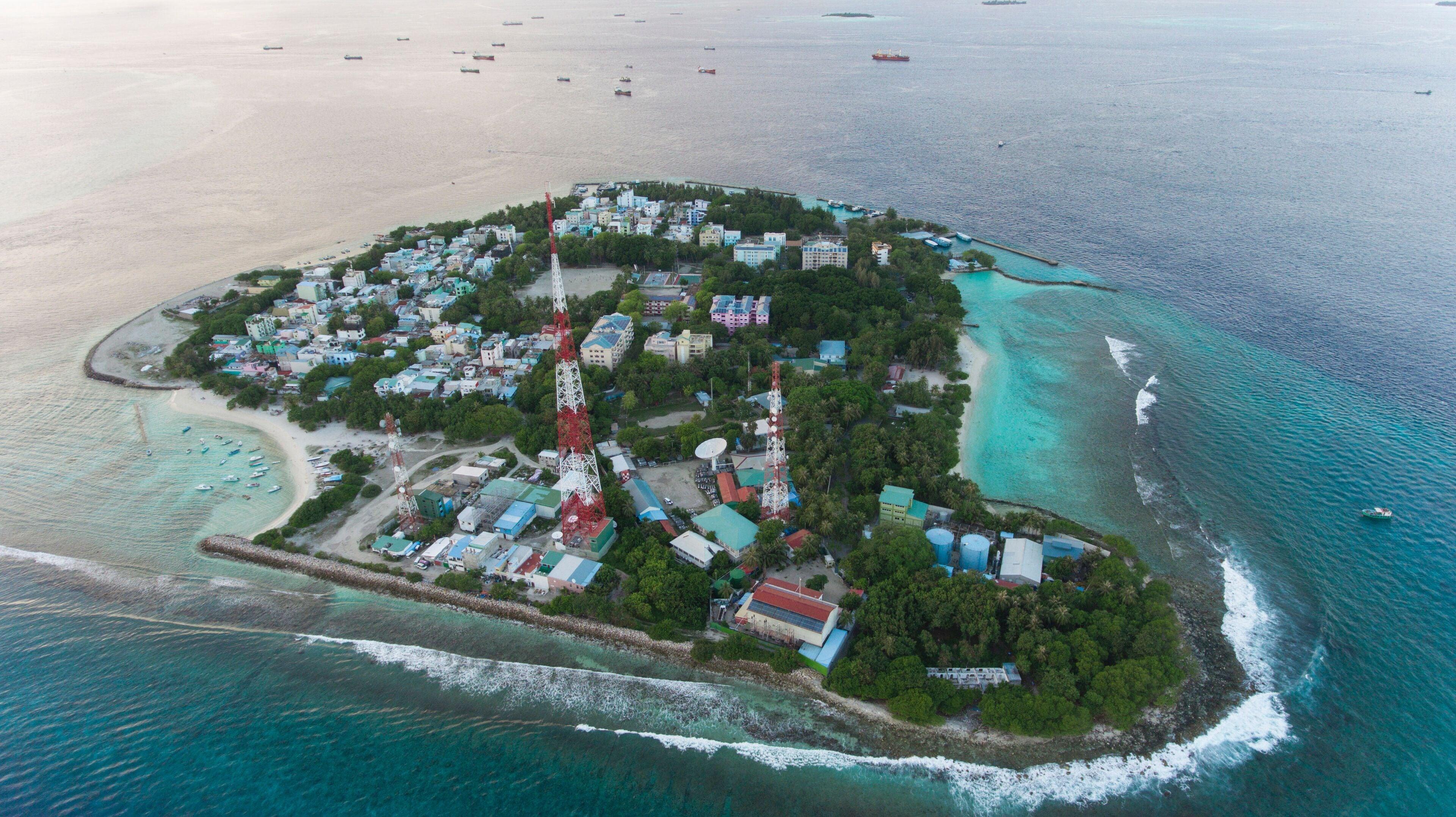 From Malé: Village Tour, Scenic Ferry & Guided Snorkeling