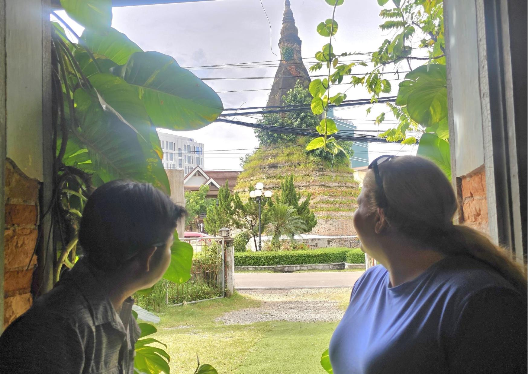 Vientiane: Private City Tour by EV TukTuk with Guide