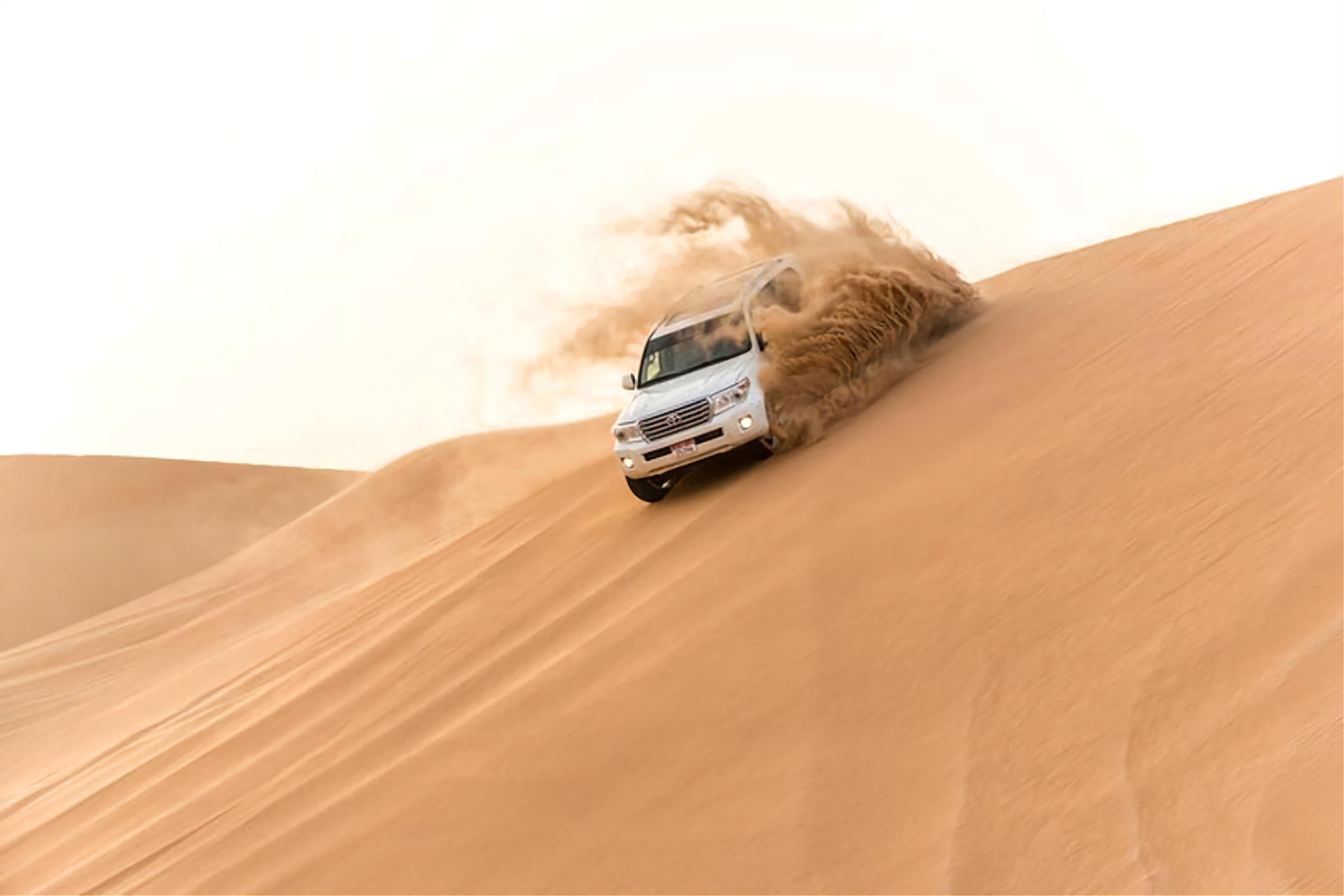 Doha Qatar : sealine adventure Camel Ride sandboard Sunset 2