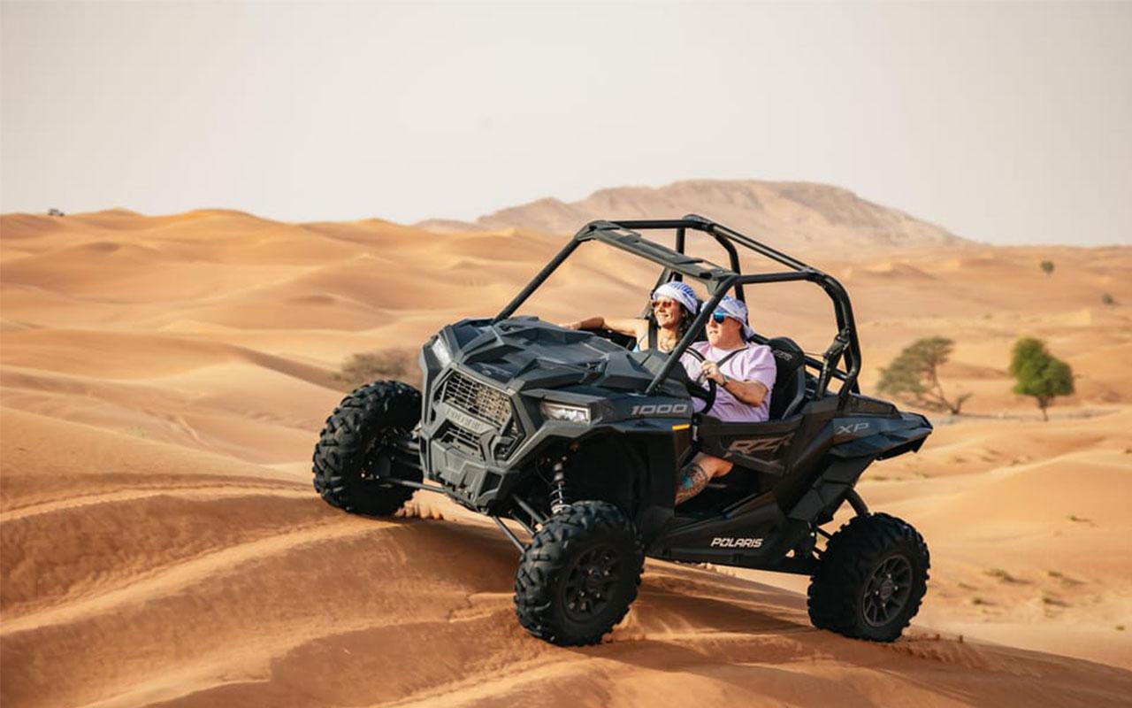 Dubai: Quad Bike, Dune Buggy, and Sandboarding Experience 2