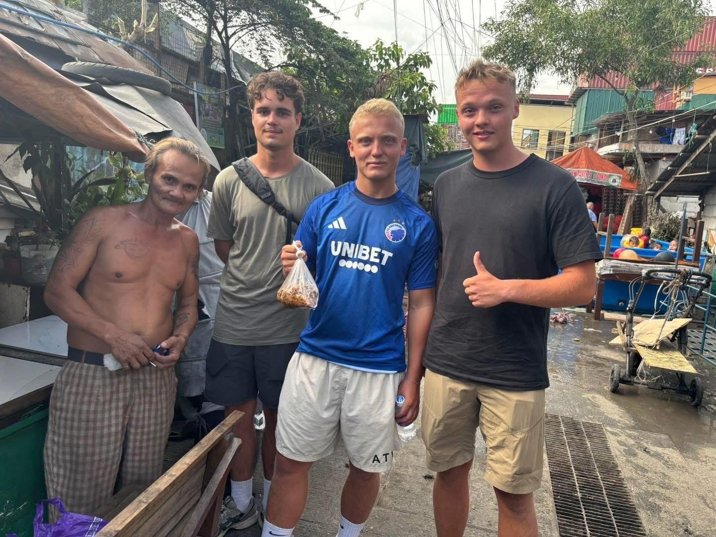 Manila slums: happy land, local Market and Local Street food