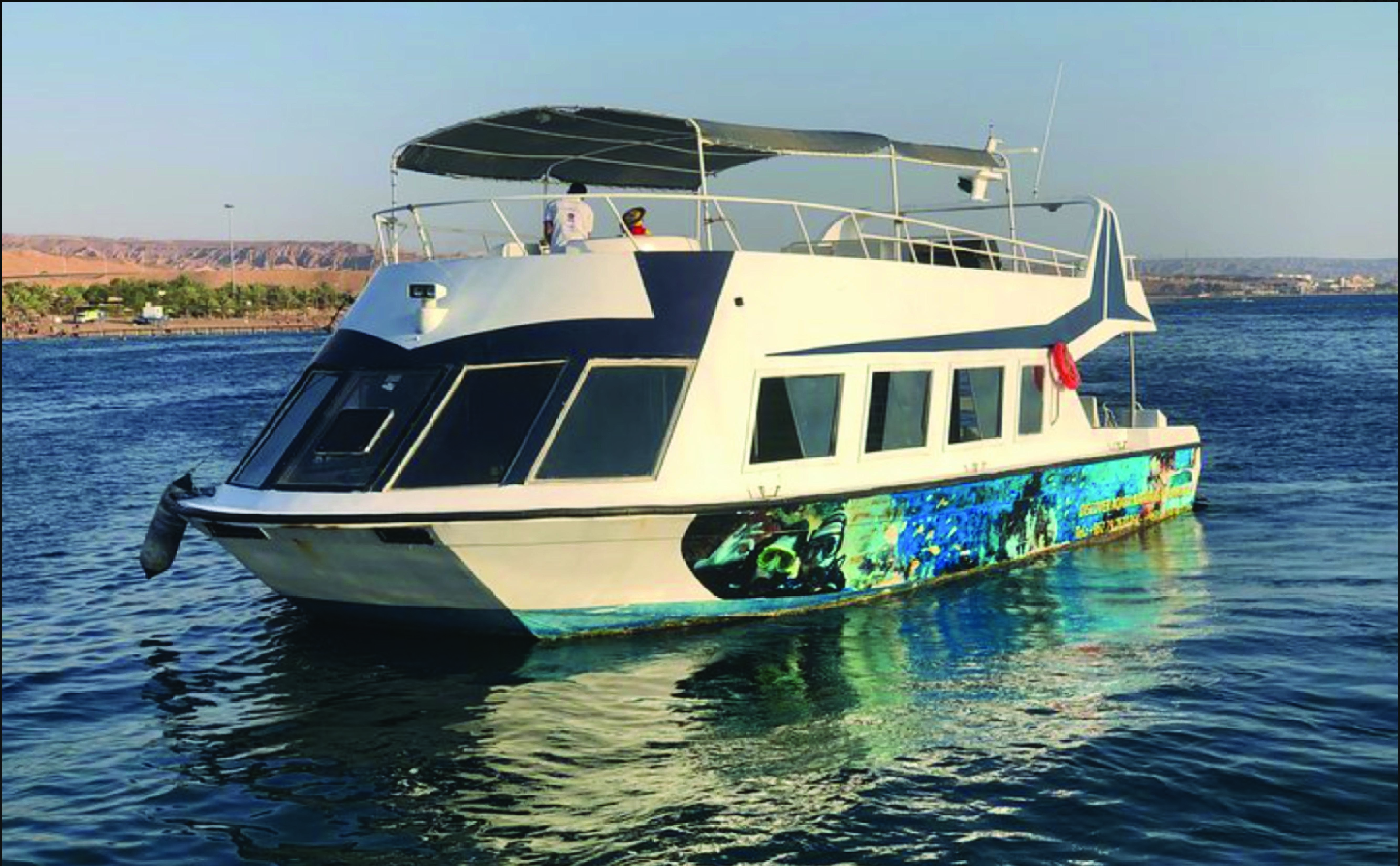 Glass Boat & Snorkeling with day use of Berenice Beach Club 3