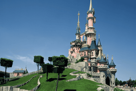 Sleeping Beauty Castle lit by drones and fireworks