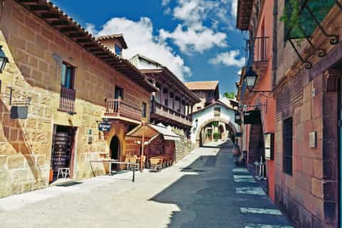 Picturesque plaza and façades inside Poble Espanyol