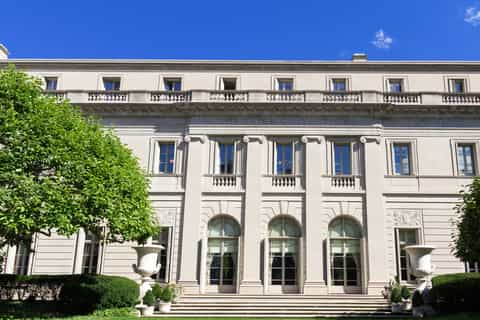 Exterior of The Frick Collection mansion with garden