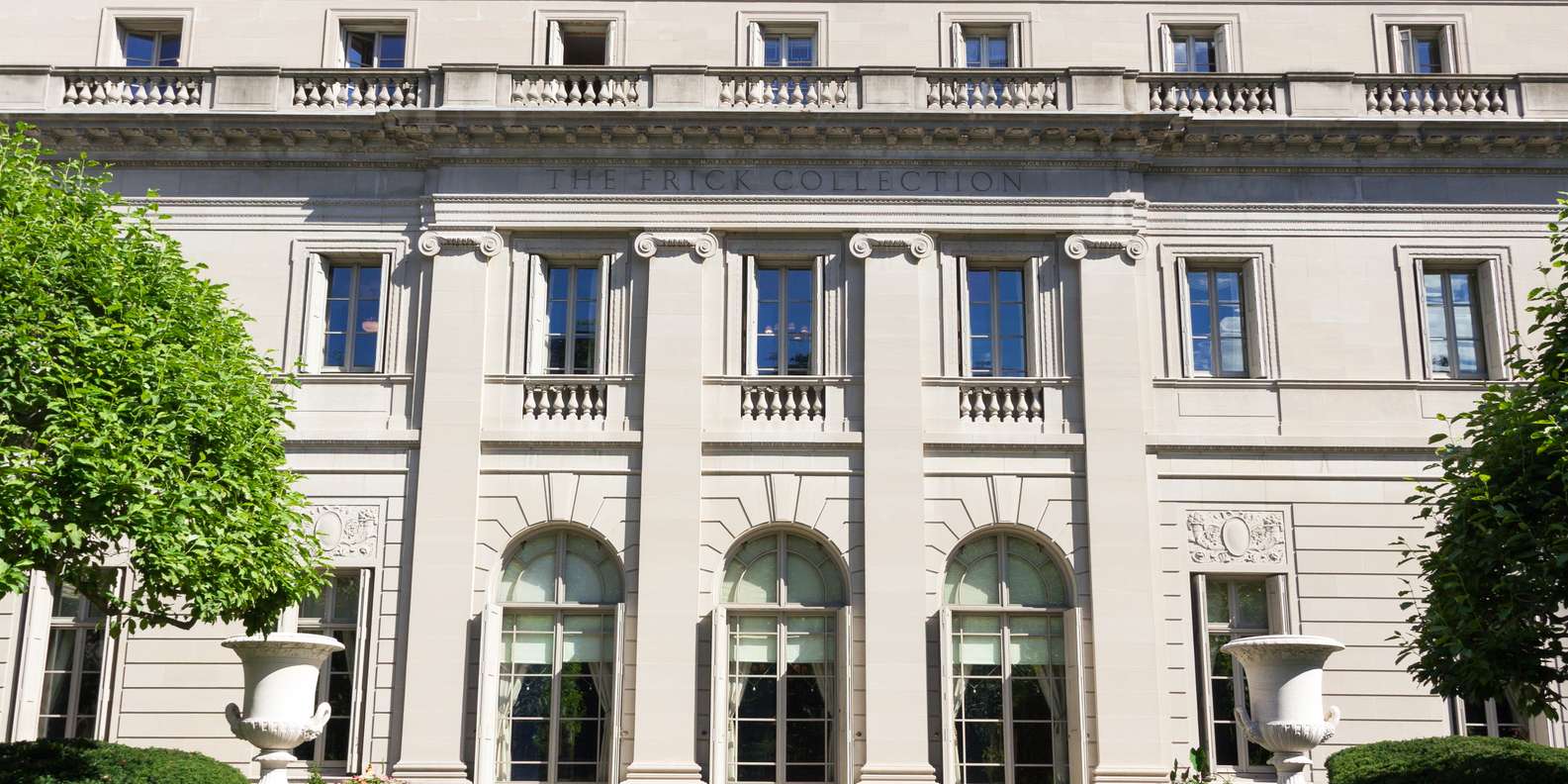 Passengers boarding a budget airport shuttle bus in Rome