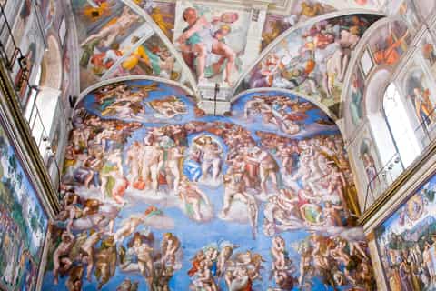 Visitors gazing at Michelangelo's ceiling