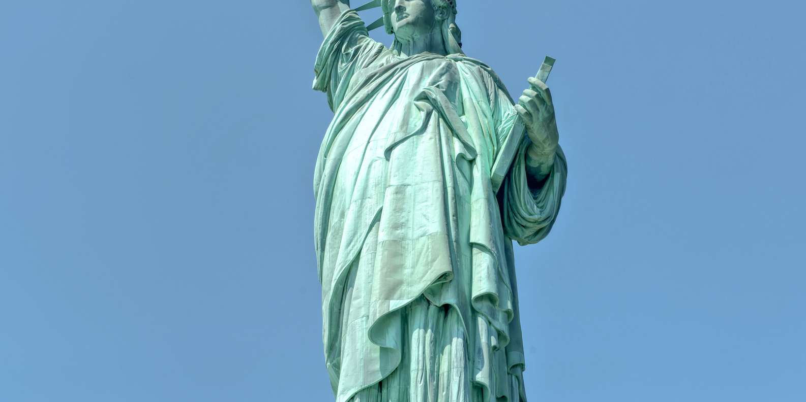Liberty Island museum and close-up view of the Statue of Liberty