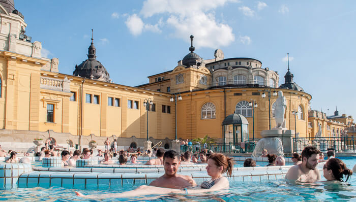 Steam rising over the pools at Széchenyi Spa in winter