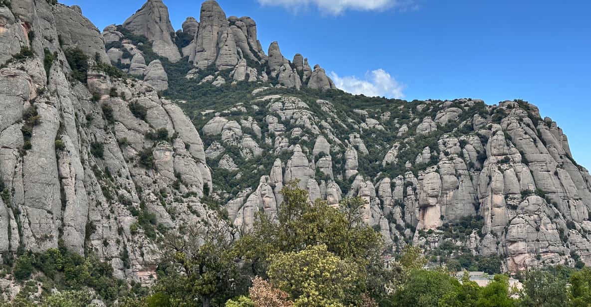 From Barcelona: Montserrat Guided Tour & Return Bus Transfer
