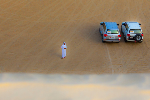 Gratis kamelenrit; Woestijnsafari dunebashing; ZandboardenWoestijnsafari bij zonsondergang aan de binnenzee