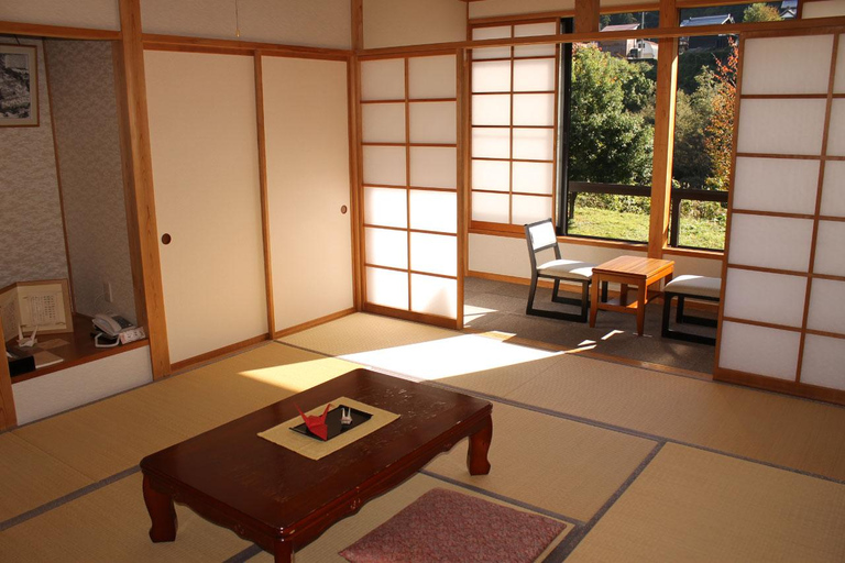 Nagano: Winter Holiday Snowmobiling in Nozawa Onsen Area