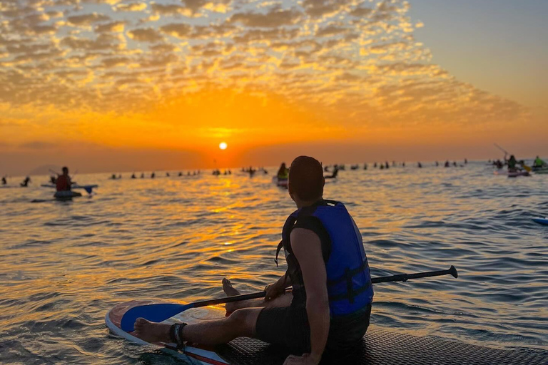 See the Sunrise in Copacabana from a Stand Up Paddleboard with Photos