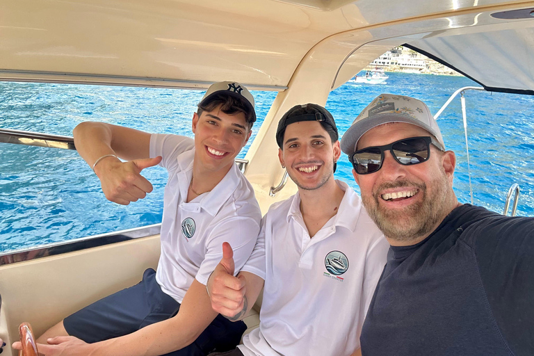 Capri Boat Tour with Caves, Swimming, Aperitif and Champagne From Capri: PRIVATE Capri Boat Tour