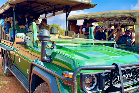 Maasai Mara Day Game Trip in Open Sided 4x4 Safari Jeep