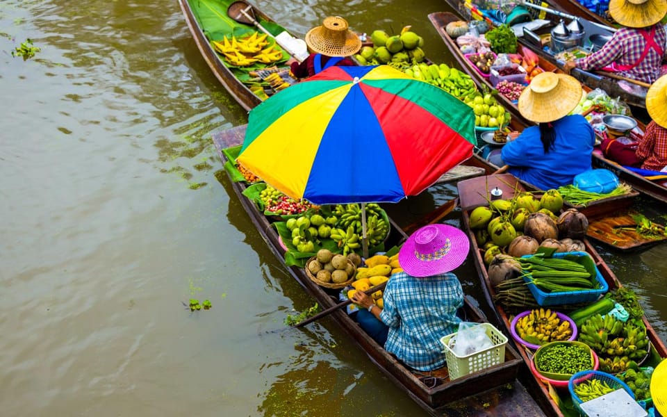 Bangkok: Maeklong Railway and Floating Market Tour | GetYourGuide