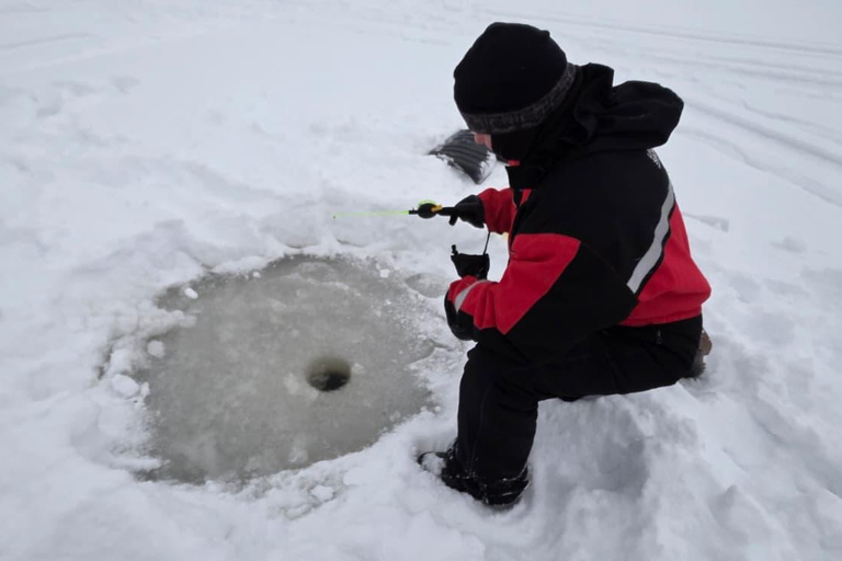 Levi: Ice Fishing Experience with Bonfire and Lunch