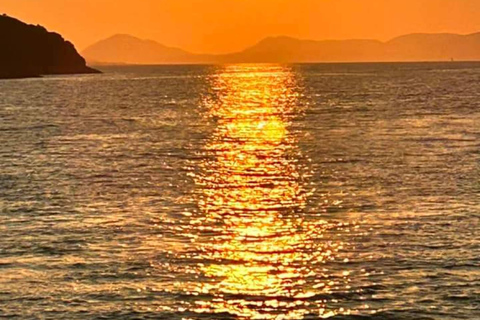 From Lefkimmi: Blue Lagoon Sunset Glass-Bottom Boat Cruise