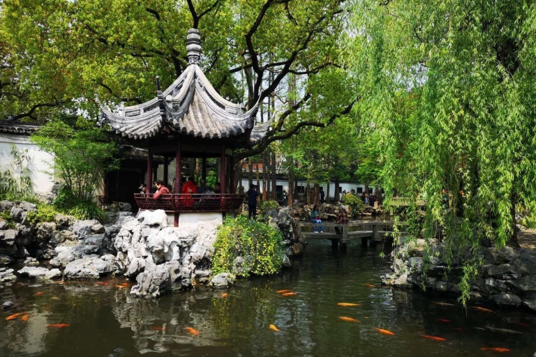 Shanghái: tour privado a pie por el jardín Yu y el templo del Dios de la ciudadTour con sopa de albóndigas y recogida en el hotel.