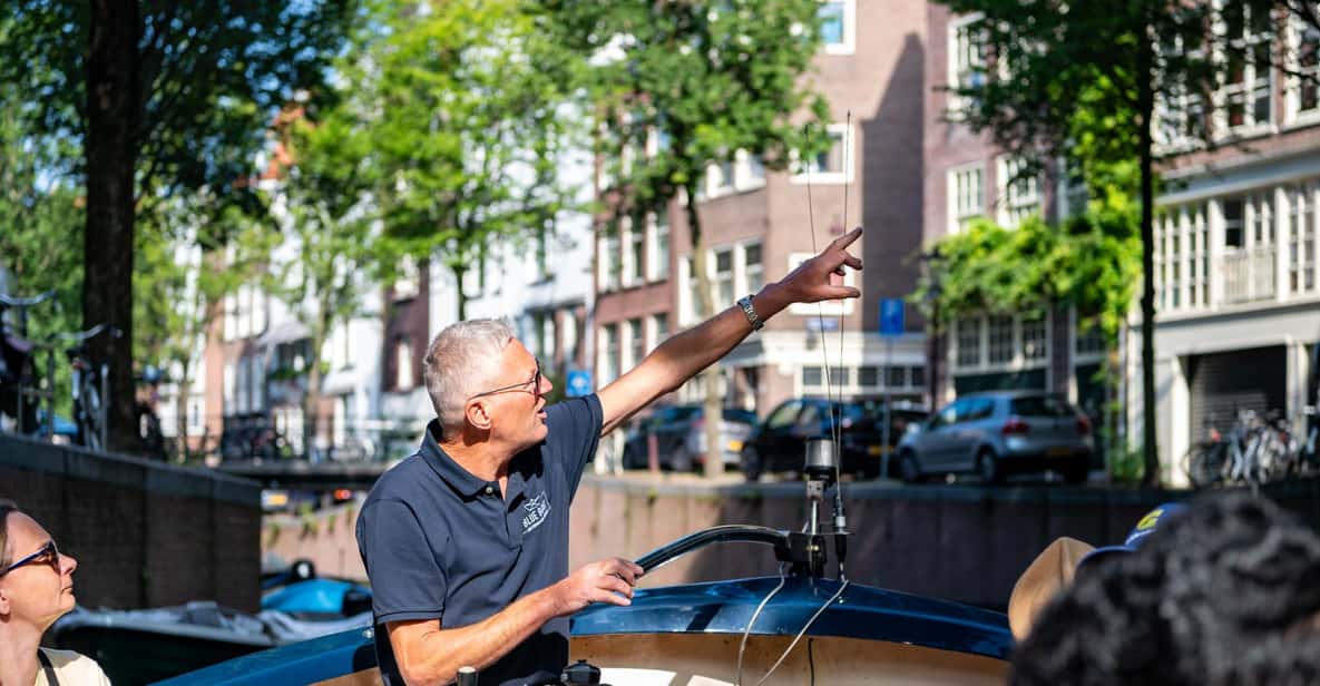 Afbeelding 2 van Amsterdam: Grachtenrondvaart met gids in een open boot langs hoogtepunten