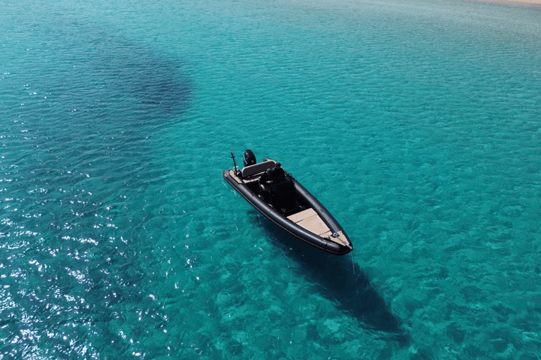 Naousa: Dagtrip Rineia, Delos &amp; Naxos per boot met drankjes