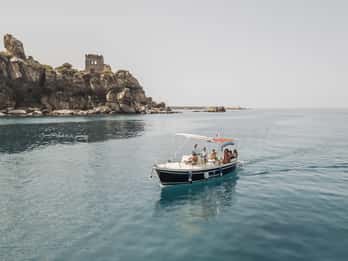 Day trips along the coast of Cefalù with swimming, snorkeling, and aperitif