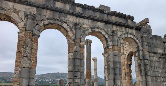 From Fes: Volubilis, Moulay Idriss & Meknes Day Trip with Guide