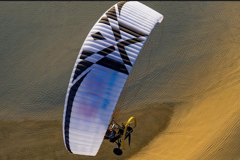 Doha: vuelo en paratrike sobre el desierto de Sealine con recogida