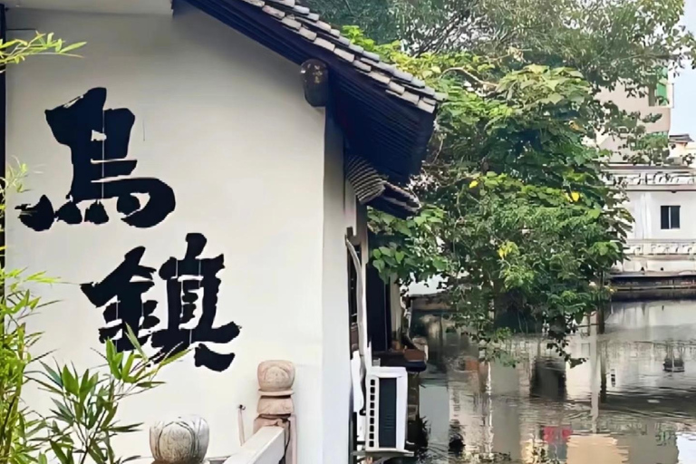 From Hangzhou: Wuzhen Water Town Tour with Riverside Essence Guide for other languages