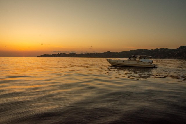 Visit Bonifacio Sunset Aperitif Dining Boat Tour in Figari, France