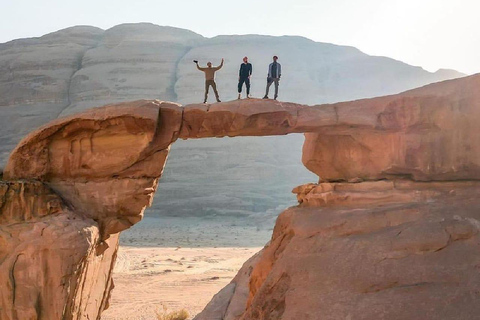 overnight: sleep under the stars in the cave in Wadi Rum Protected Area Caml tour