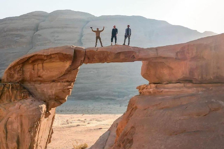 overnight: sleep under the stars in the cave in Wadi Rum Protected Area Caml tour