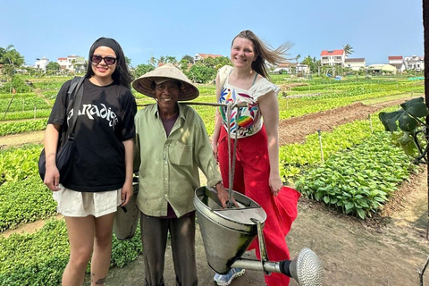 Hoi An Bike Tour: Ride a Buffalo & Duck Farming Experience Hoi An Bike-Organic Farm-Duck game-ride Buffalo-Basket boat