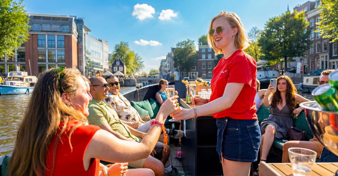 Afbeelding 2 van Amsterdam: grachtenrondvaart met gids en drankjesoptie