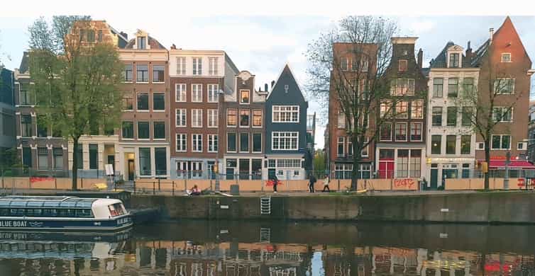 Amsterdam: Day City tour with local Guide in German