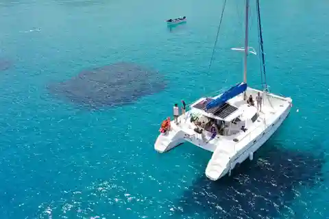 Modern Private Catamaran excursion + drinks Lunch and Music.