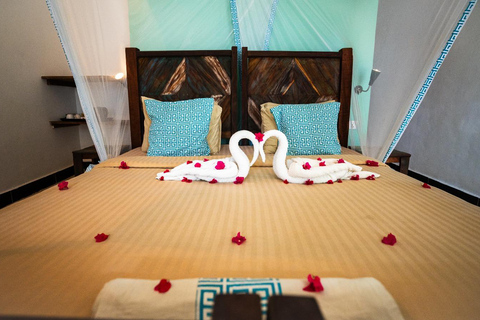 From Zanzibar: 2-Day Mikumi Safari & 2 Game Drives & flight