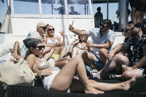 Lisbon Boat Party w/ Open Bar, Music and Swimming Stops Lisbon: Catamaran Boat Party with Music, Open Bar & Swimming