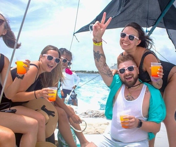 Isla Mujeres Catamaran Tour with Unlimited Drinks & transfer