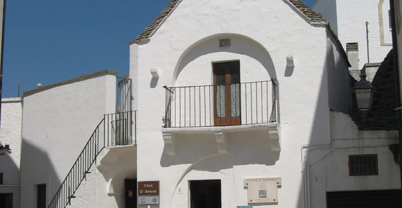 From Polignano a Mare: Alberobello guided visit: trulli, history and culture
