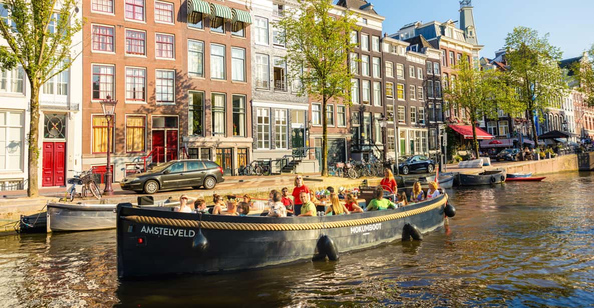 Afbeelding 12 van Amsterdam: grachtenrondvaart met gids en drankjesoptie
