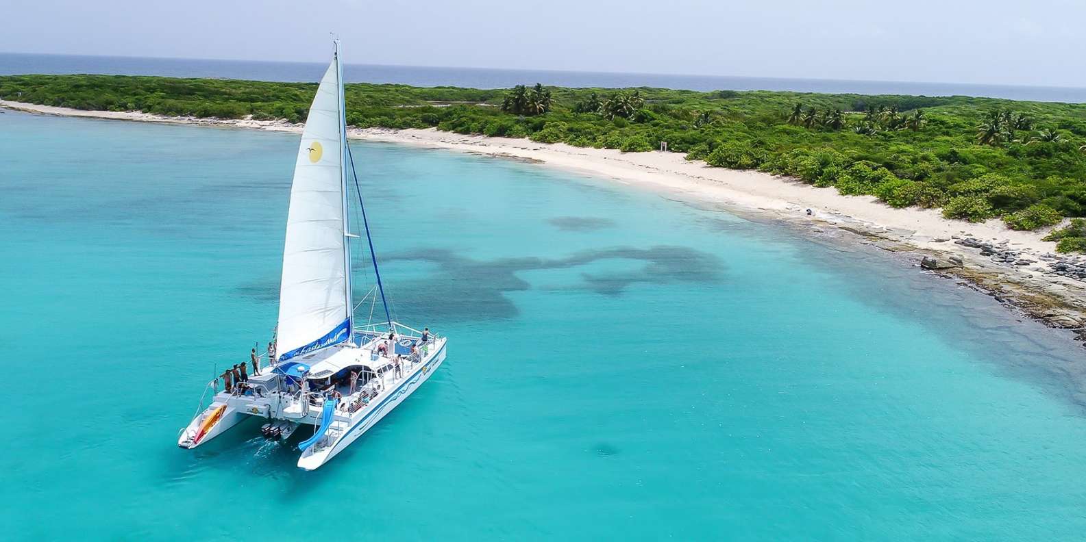 icacos deserted island catamaran & picnic cruise