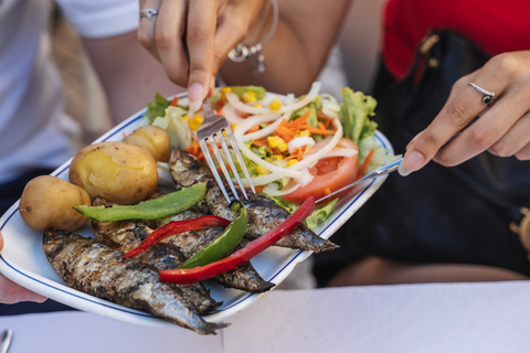 Lisbona: tour gastronomico della Baixa con bevandeTour di gruppo