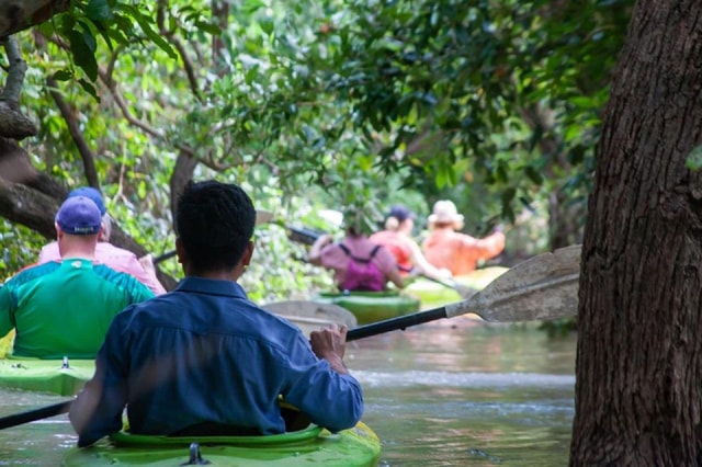 Kayaking on the lake & floating village