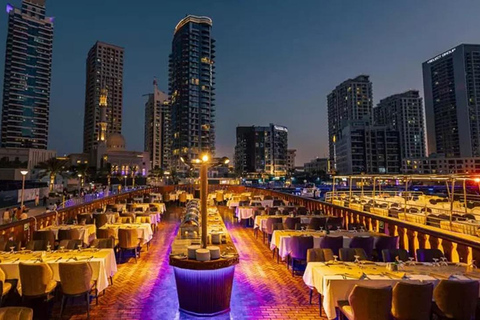 迪拜：码头游船晚餐巡游，附现场娱乐表演马里纳游轮 + 晚餐 + 现场表演（共享接送）