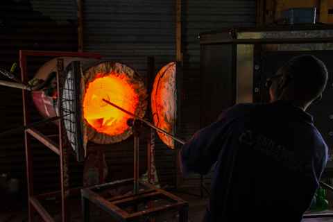 Kampala: Glassblowing, Beadmaking, and More Art Experience Blowing Glass Bubbles