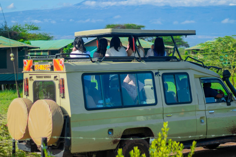 Nairobi National Park Half Day Guided Safaris in 4x4 Vehicle Private Half Day Guided Safaris in 4x4 Open roofed Van