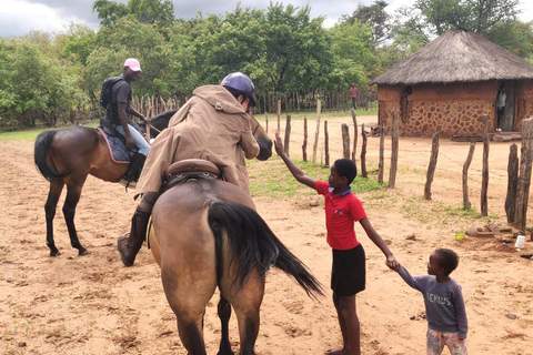 Victoria Falls: African Village Community Tour on Horseback